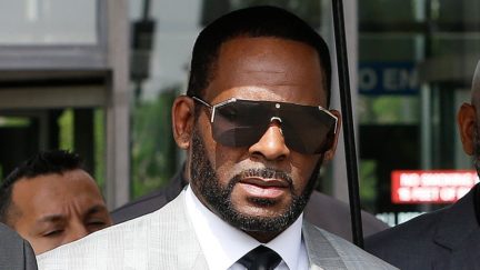 A photo shows R. Kelly leaving court.